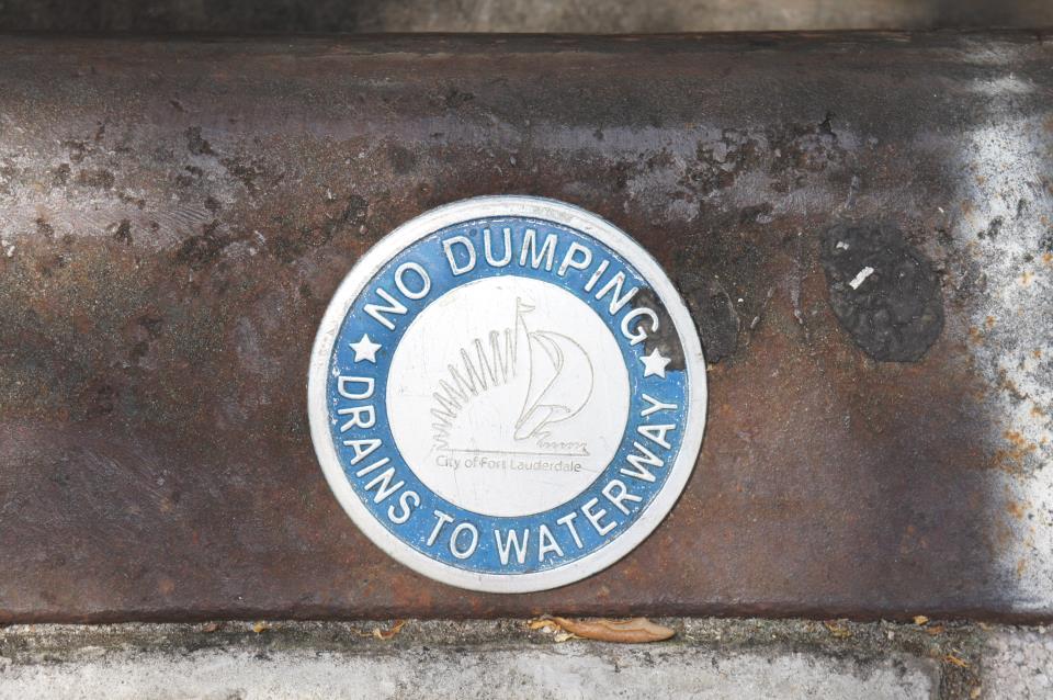 Storm drain marker close up