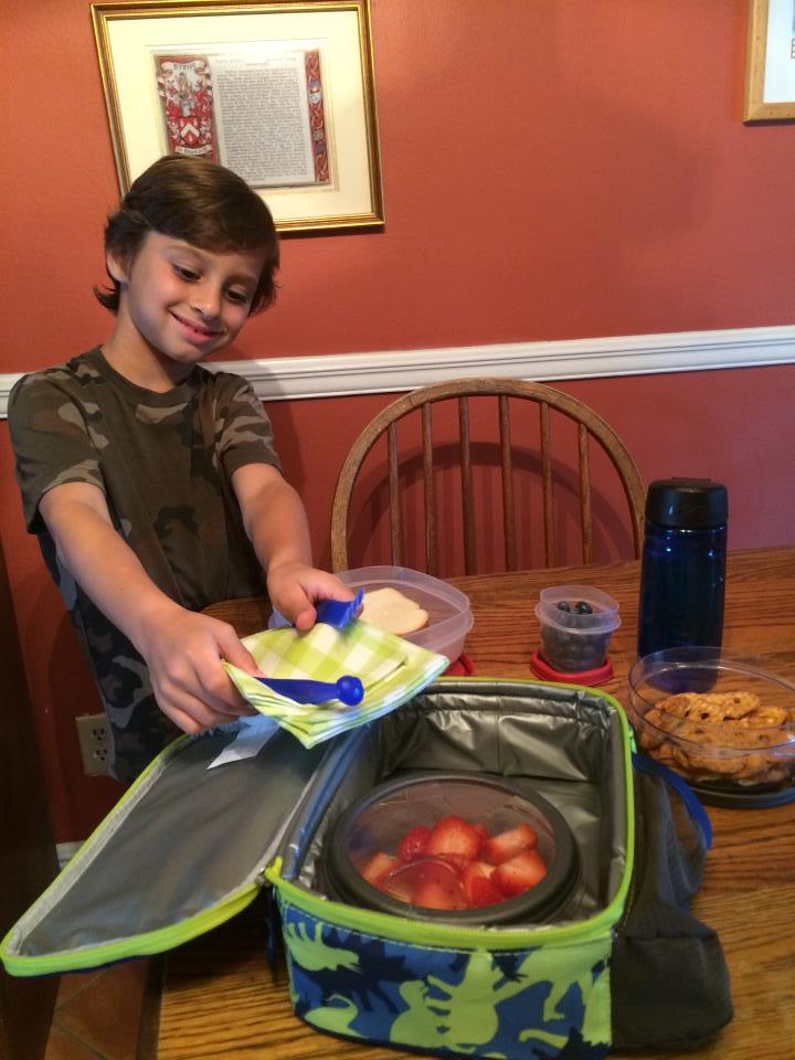 Boy with reusable tableware